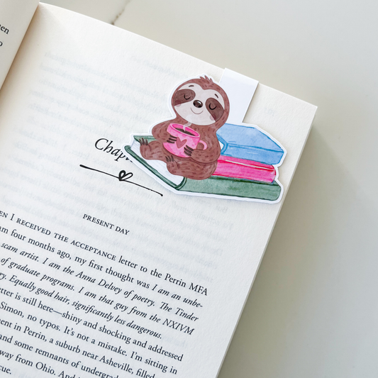 Bookmark with a sloth a cup of coffee on a stack of books